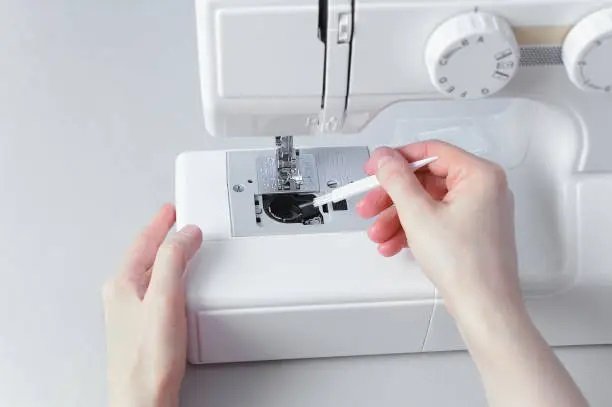 Cleaning the sewing machine