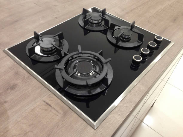 New gas stove the necessary kitchenware for home isolate on white background