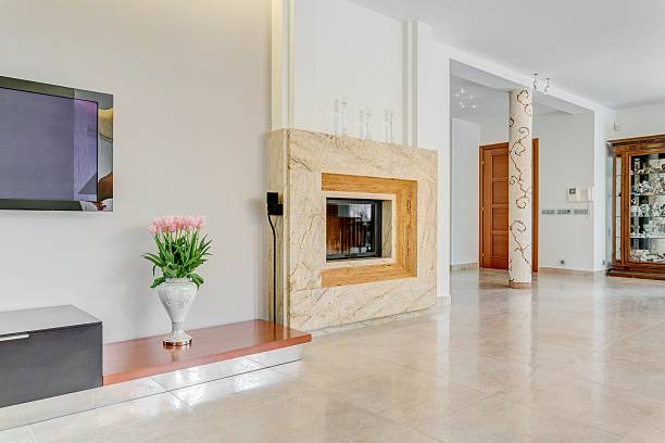 Picture of large fireplace in living room of posh villa