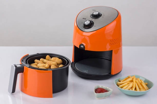 Air fryer machine with chicken and french fried